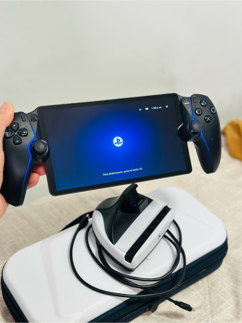 Sony Black Handheld Gaming Controller with Blue Accents